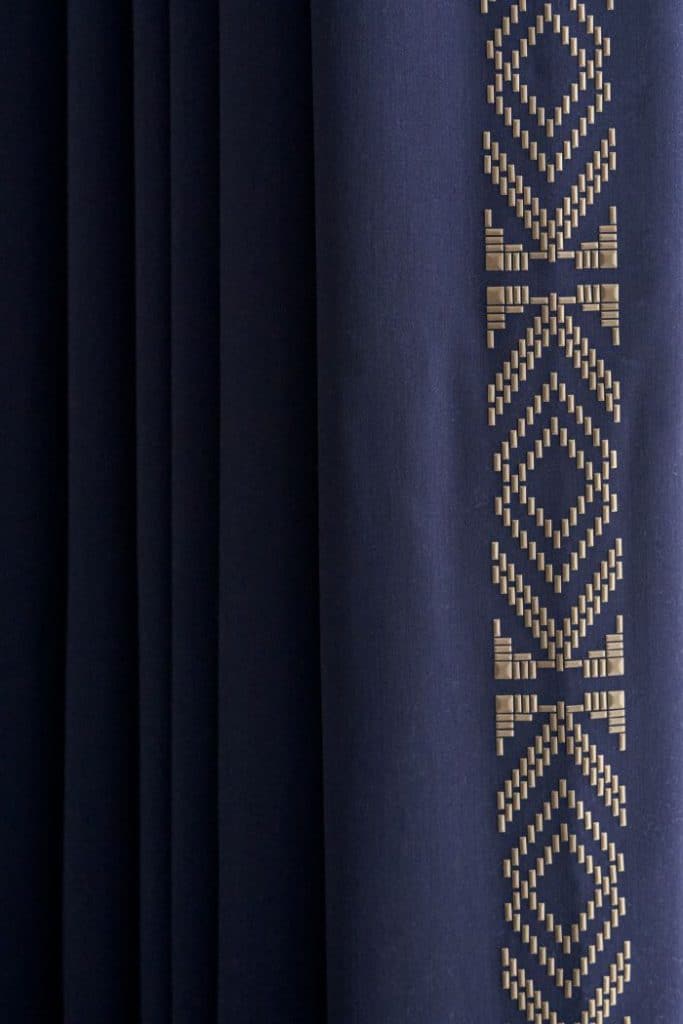Elegant heat applied beads to lead edge of curtains.