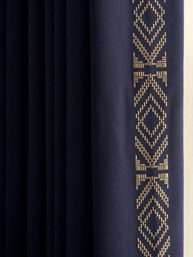 Elegant heat applied beads to lead edge of curtains.