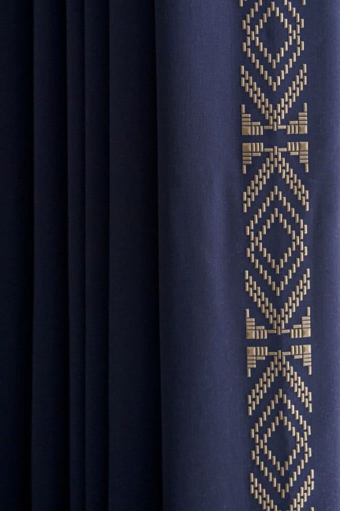 Elegant heat applied beads to lead edge of curtains.