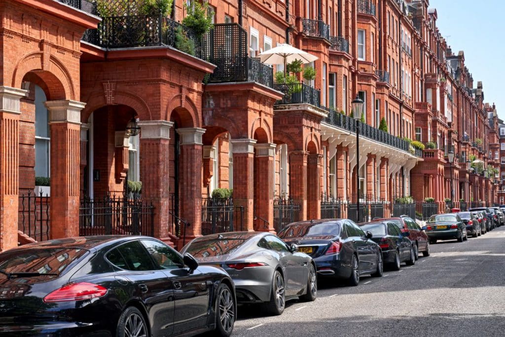 An image of red brick period luxury properties in London.
