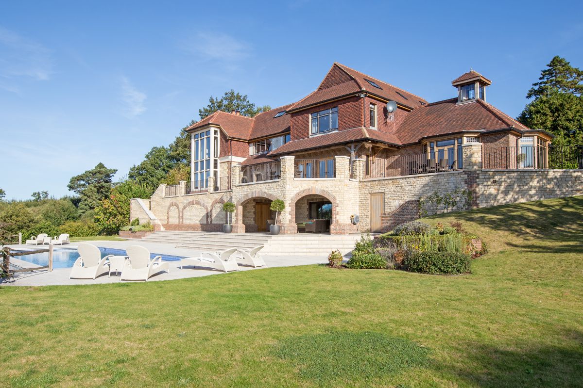 Pool view of Spur Point Mansion in Haslemere, Surrey