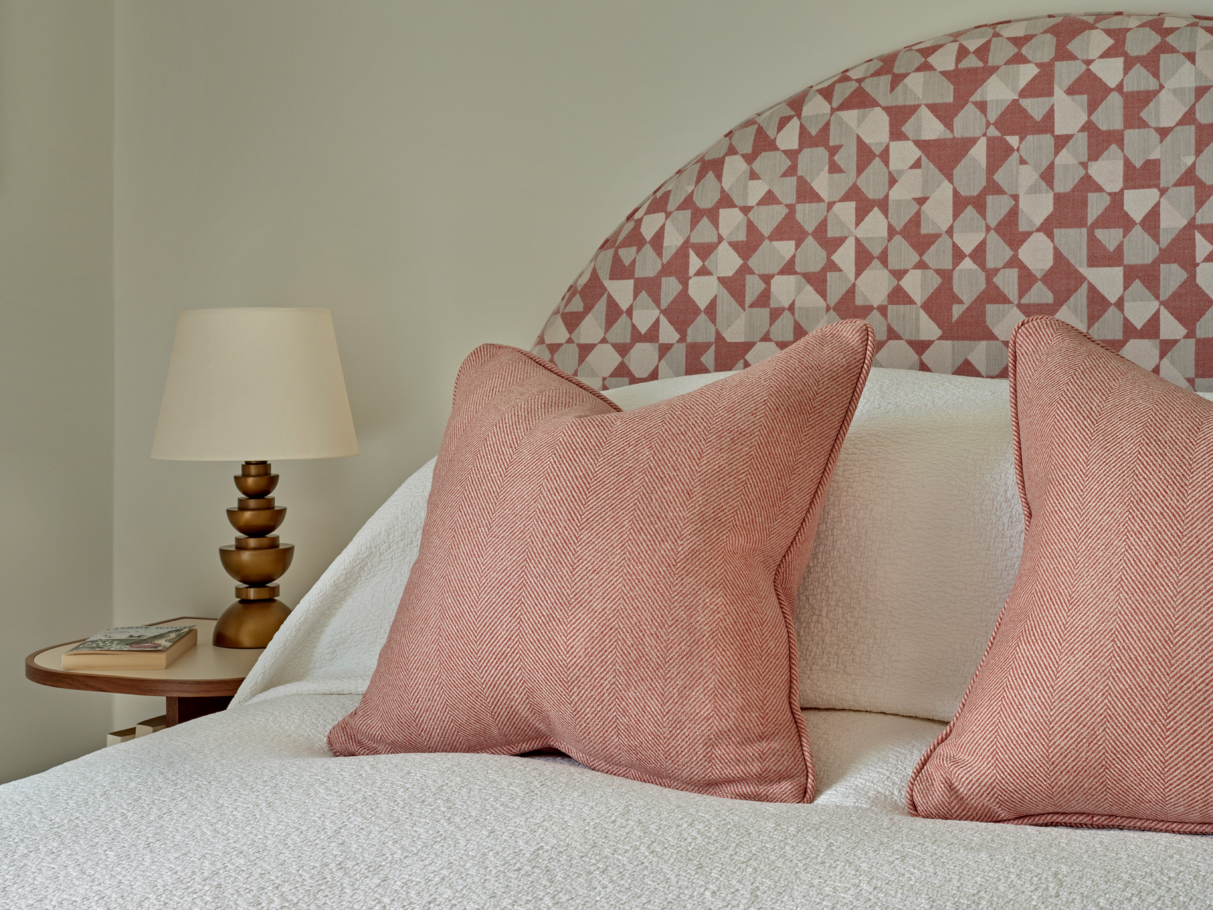 andrew martin scatter cushions on bed to give a little colour to the neutral tones of the bed linen.