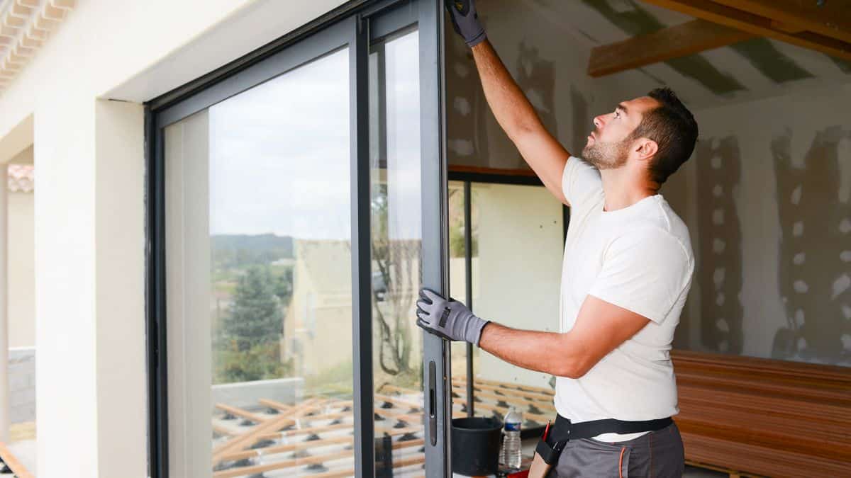 Man installing energy efficient windows