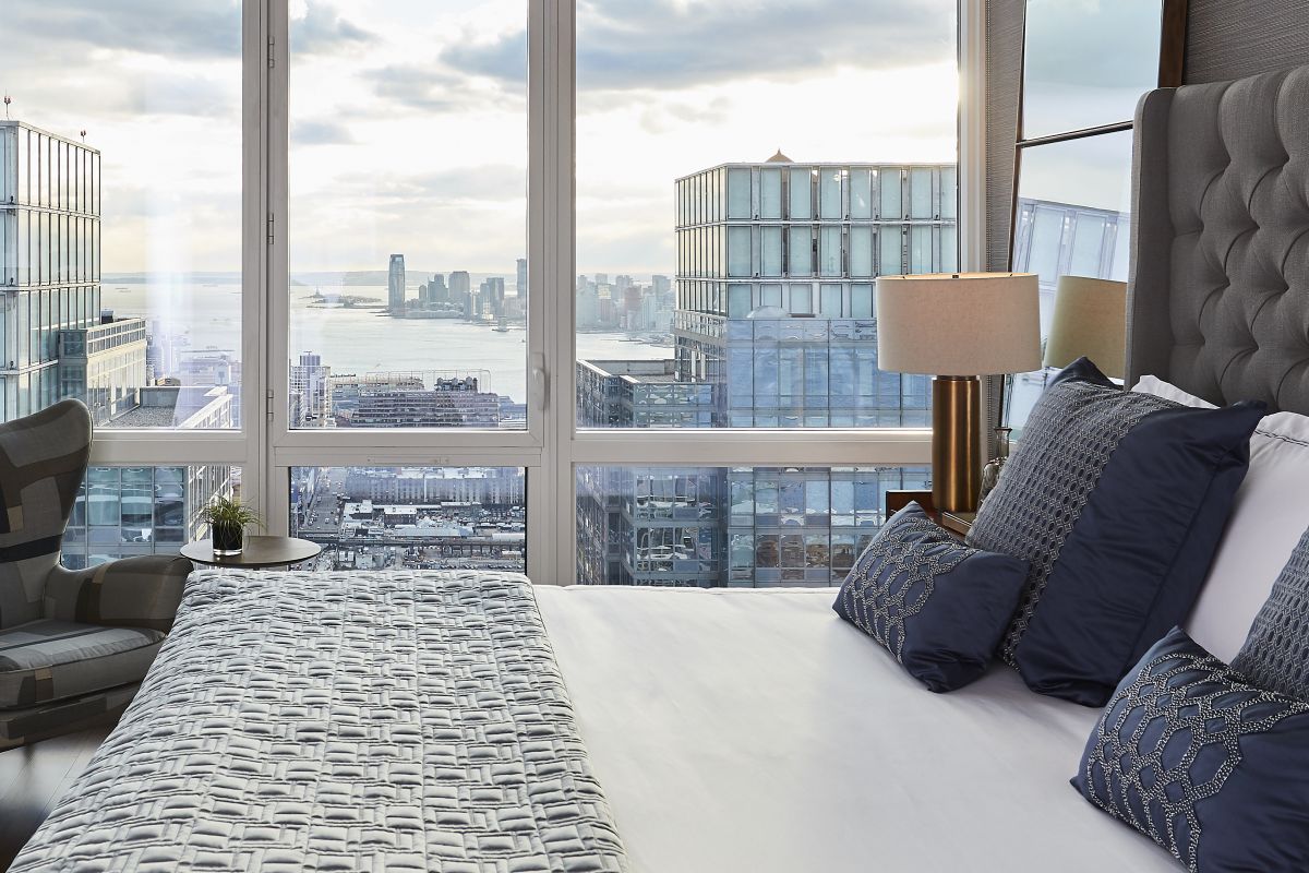 The view from the principle bedroom in a Manhattan Penthouse with a masculine colour palette. 