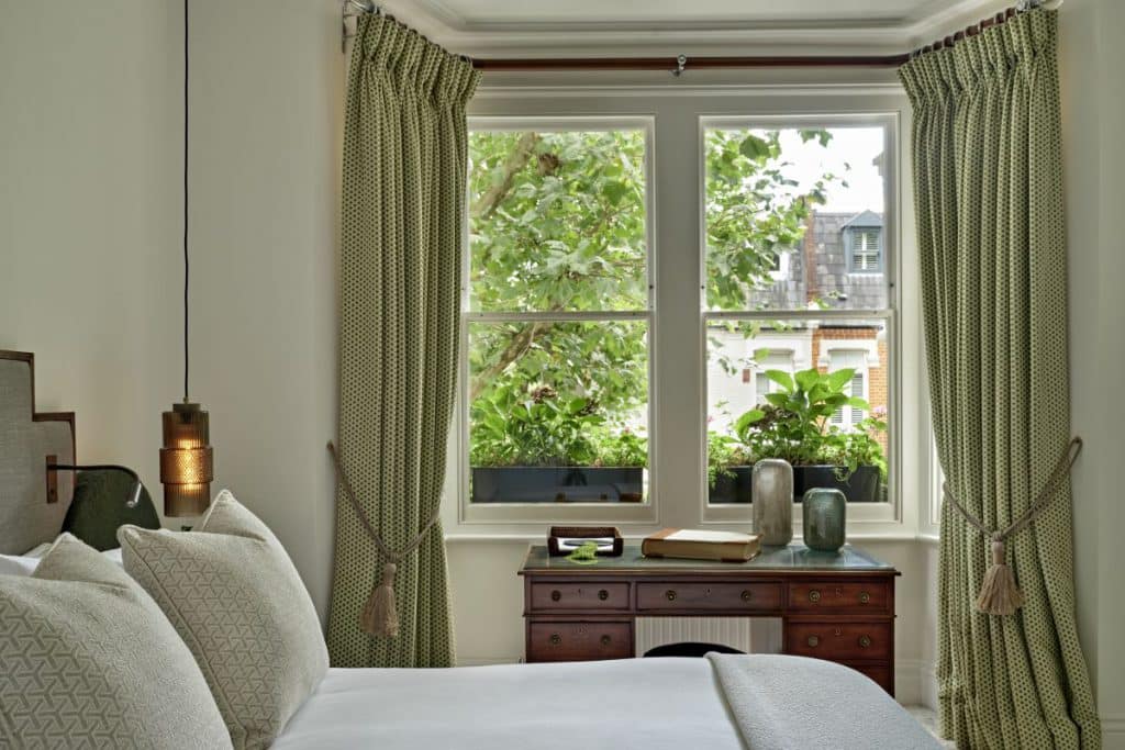 Principle bedroom in large sash windows in Parsons Green London.