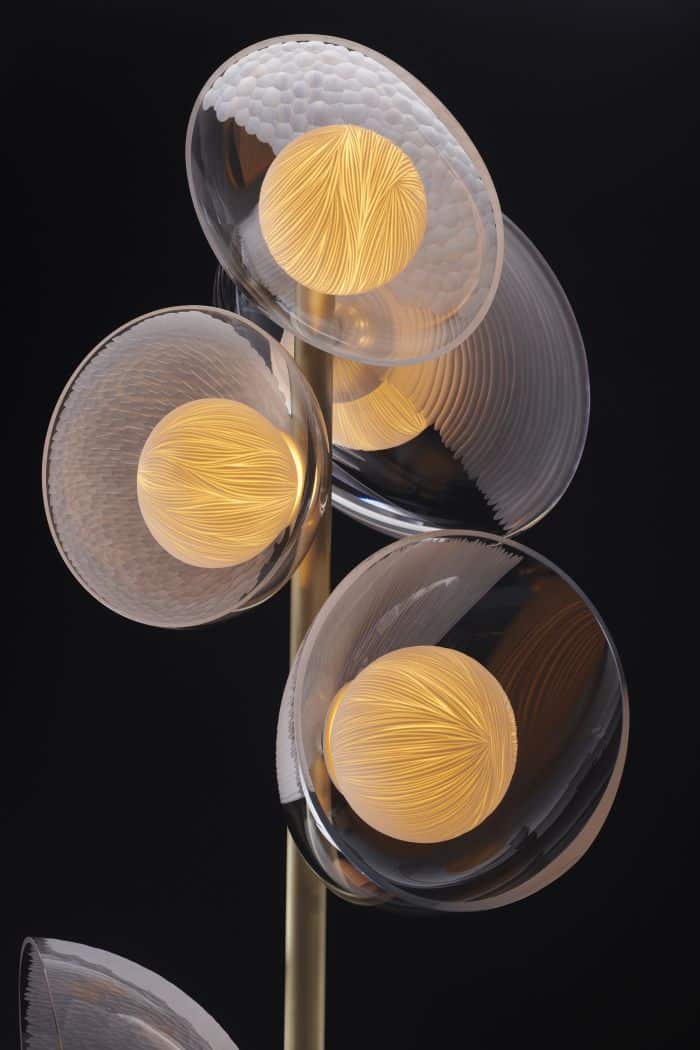 Vezzini and Chen, Mirage Floor Light, 2019 Ten blown and cut glass lights with carved parian porcelain interior components mounted on a brass stem.