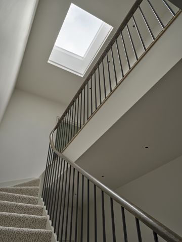A classic contemporary staircase in London home. The neutral tones of the staircase create a very calming atmosphere.