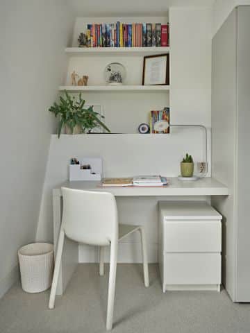 Desk in a boys bedroom in neutral colours.